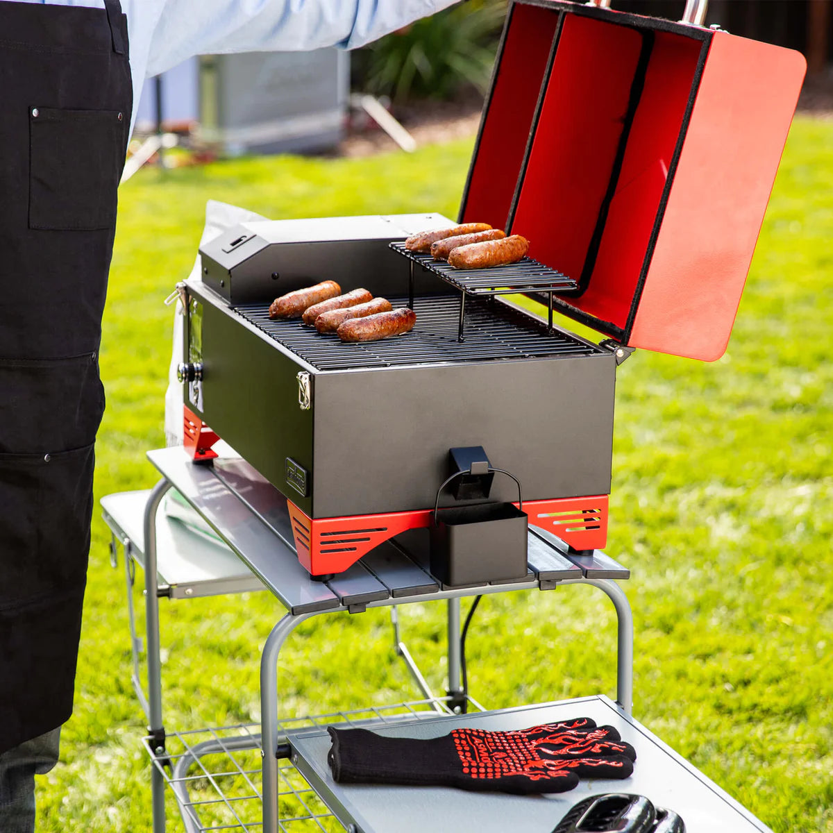 Portable pellet outlet smoker