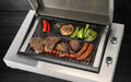 electric bbq cooking steak and vegtables 